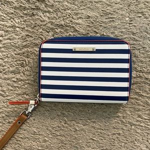 This is a navy and white striped Stella & Dot wallet wristlet.